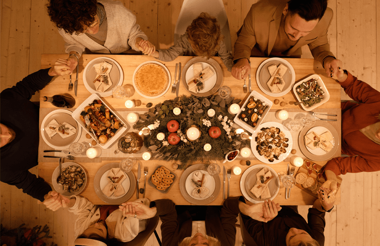 Holiday gathering with table full of food